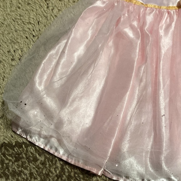 Dorissa sparkle tulle pink dress with a gold tie. - Picture 2 of 7